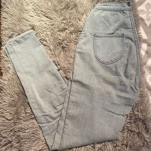 High waisted light blue jeans